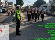 Sat Lantas Polres Tanjungbalai Lakukan Pengamanan Lomba Gerak Jalan HUT ke 79 PGRI dan HGN tahun 2024