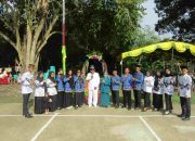 Kades Lubuk Kemiling Pimpin Upacara Pengibaran Bendera Merah Putih