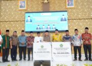 Wamenag Serahkan Bantuan Rp 20,840 Miliar Untuk Rahabilitasi Sarpras Terdampak Bencana Sumut